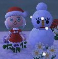 Rhya and snowmam 2014.JPG
