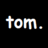 tom.